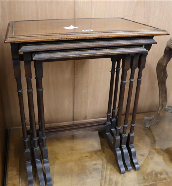 A nest of three mahogany tea tables W.51cm